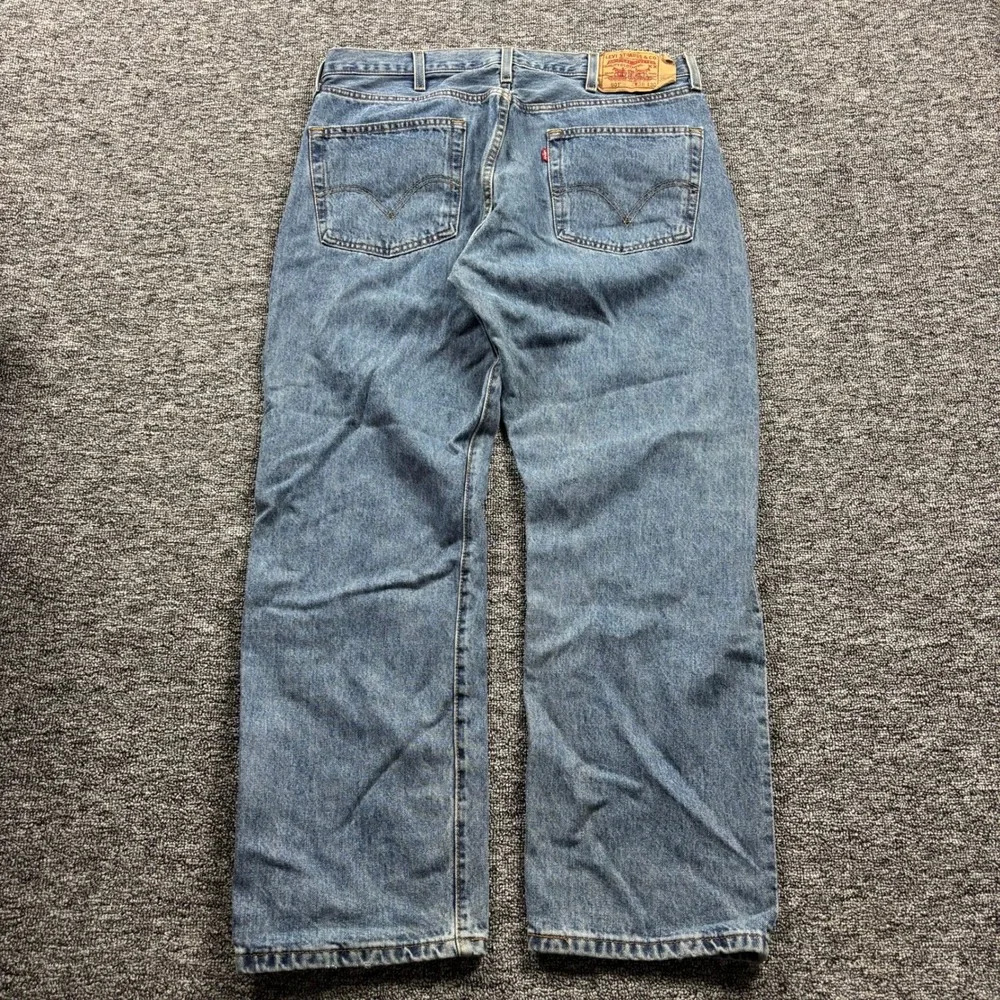 Vintage 2005 Levis 501 Straight Leg Medium Wash Blue Denim Jeans Size 38x30